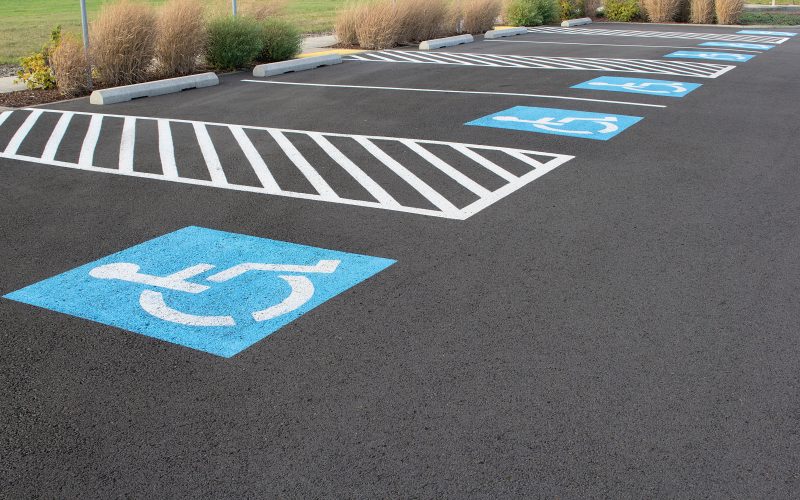 Row of handicapped parking spaces, open and available for permitted vehicles